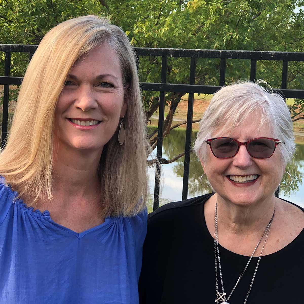 Robin and Jane standing outside smiling