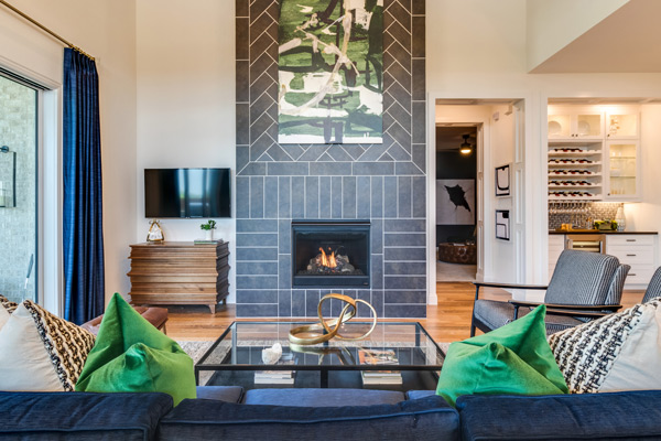 Drees Custom Homes living area with a fireplace